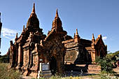 The cluster of red brick temples, named Khay-min-gha on the map on the North plain of Bagan. Myanmar. 